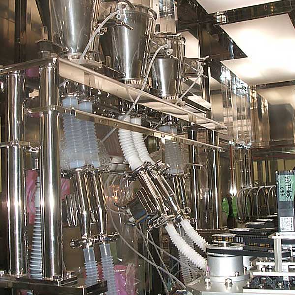 A powder filling machine in action.